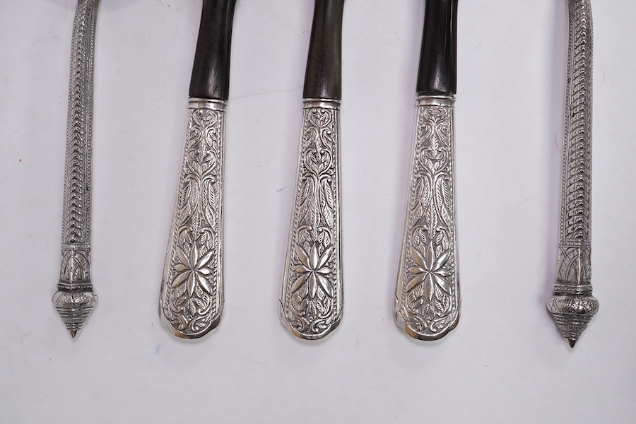 A pair of Malaysian/Indonesian white metal salad servers, fork 25.7cm and three other similar white metal handle horn servers. Condition - fair to good